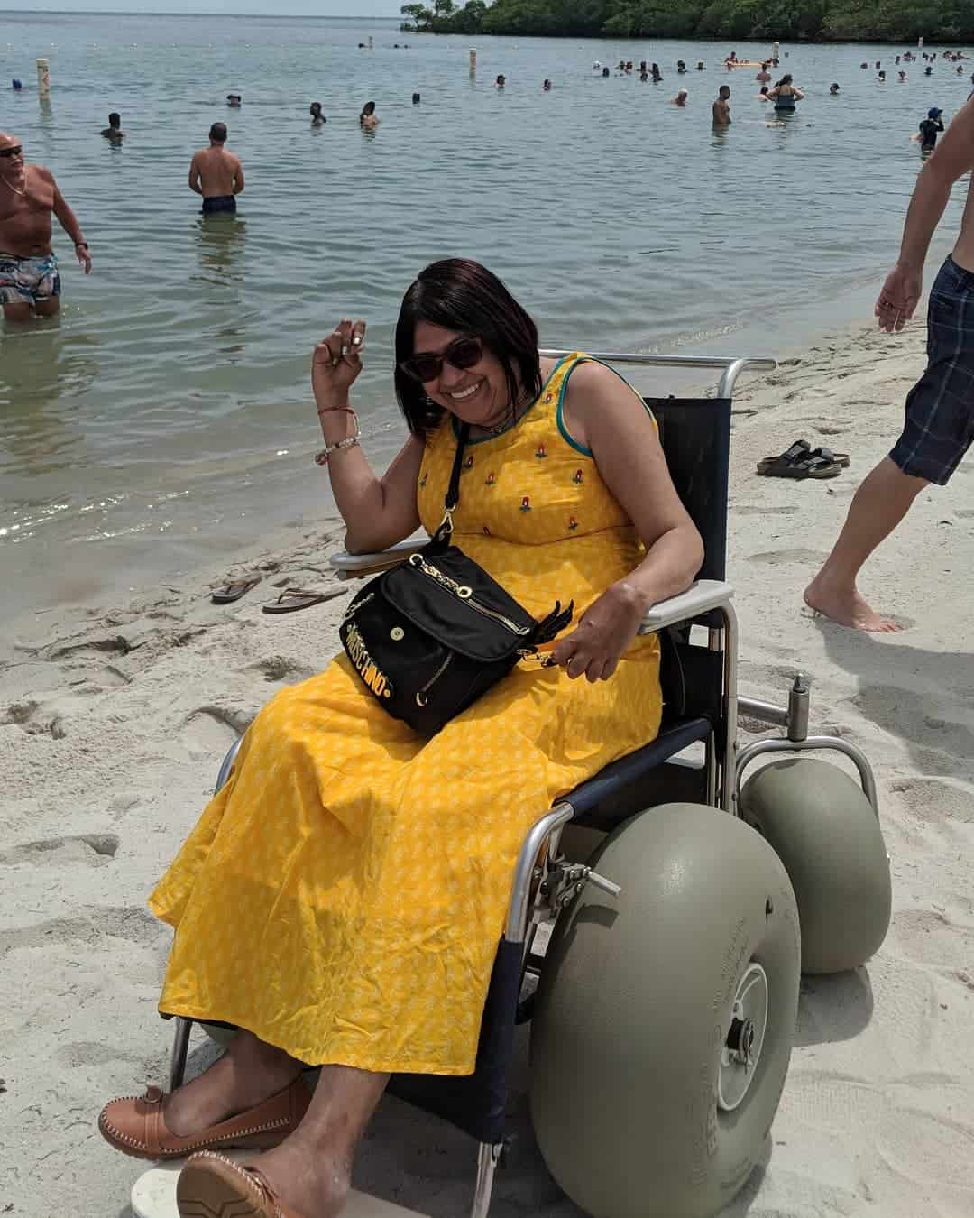 Traveling in a wheelchair on a beach